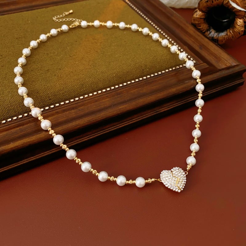 💖 Den perfekta presenten för kärlek och elegans - Magnetiskt pärlhalsband med hjärta 💖